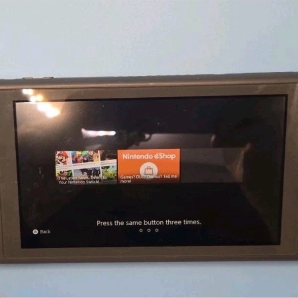 Nintendo Switch Console with Gray Housing and Black Screen